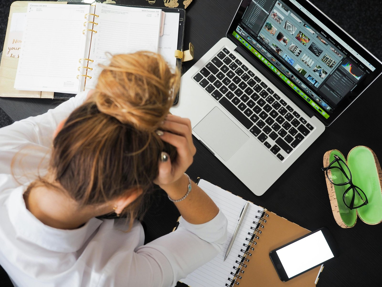 Person feeling overwhelmed by constant notifications and digital stimulation, illustrating an overstimulated nervous system