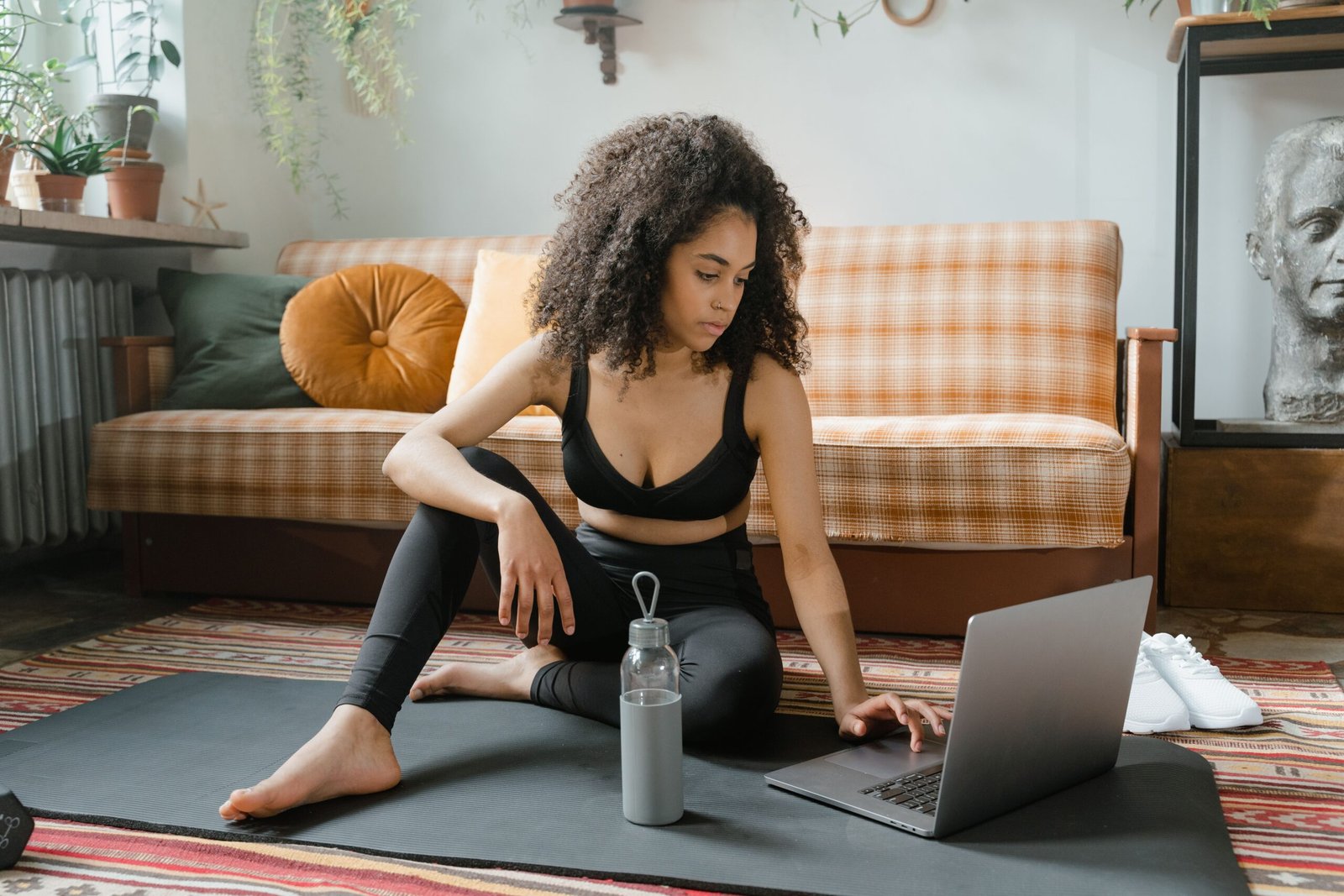 Person planning strength training routine for balanced performance, recovery, and long-term fitness results