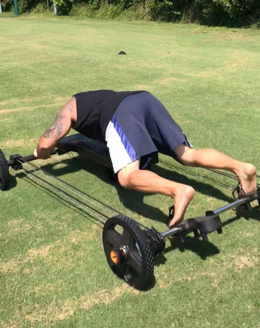 Man exercises with device called "The Frog"