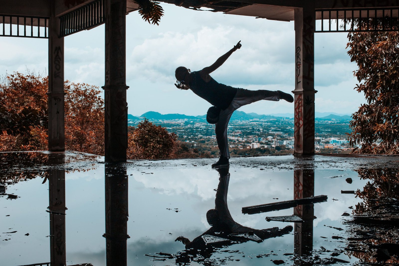 Person performing a controlled single-leg movement that demonstrates proprioception and body awareness.