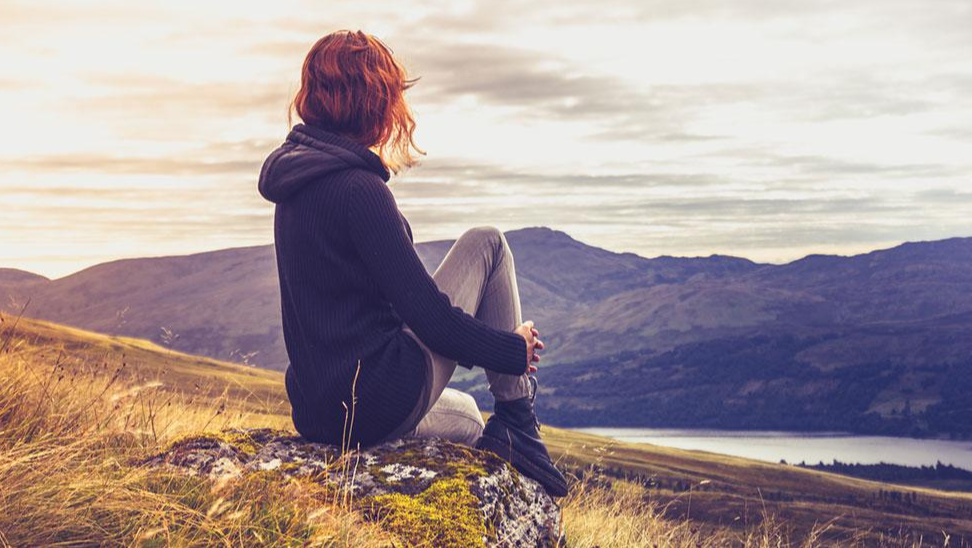Person pausing to recognize an emotional response and practice emotional regulation